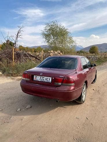 арзан матиз 1: Mazda 2: 2001 г., Кол менен иштөөчү, Бензин — 1