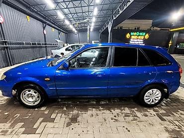 мазда 1999: Mazda Familia: 2001 г., 1.6 л, Ручные, Бензин, Универсал — 4