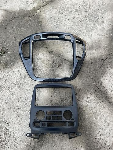 Панелдер, каптоолор: Борбордук консоль Toyota — 1