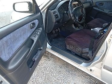 devo tiko: Mazda 626: 1998 г., 1.8 л, Механика, Бензин, Хэтчбэк — 6