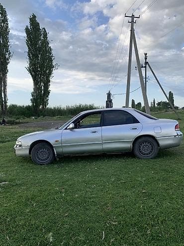 карбюратор мазда: Mazda Cronos: 1993 г., Седан — 2