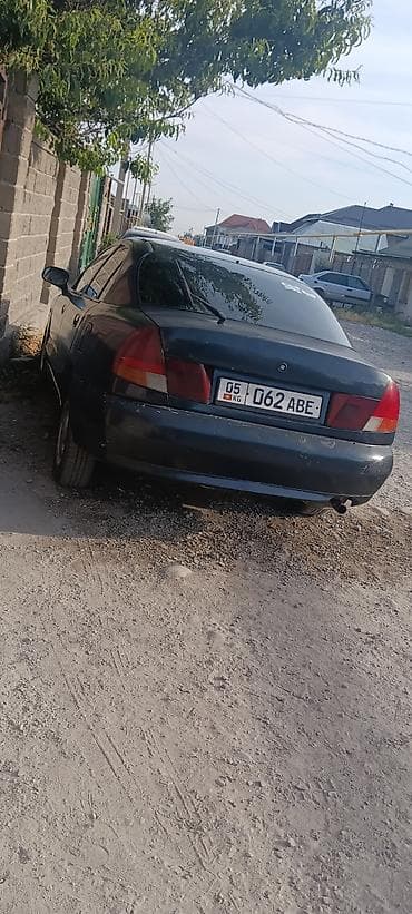 Mitsubishi Carisma: 1995 г., Механика, Седан — 5