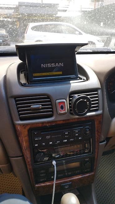 Nissan Sunny: 2004 г., Автомат, Бензин, Седан — 8