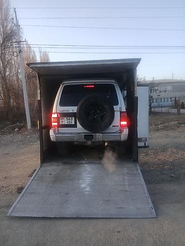 услуга авто: Услуга: перевозка автомобилей в закрытом фургоне Описание: - — 2