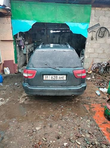 чанган юник: Продаётся легковой автомобиль универсал темно-зелёного цвета Сузуки — 2