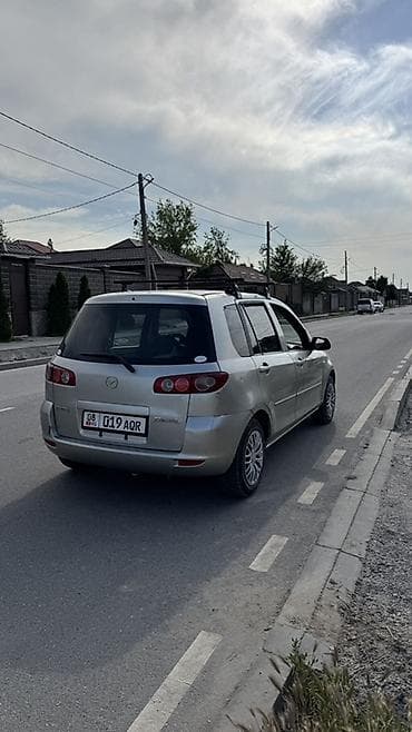Mazda Demio: 2004 г., 1.5 л, Автомат, Бензин, Хэтчбэк — 4
