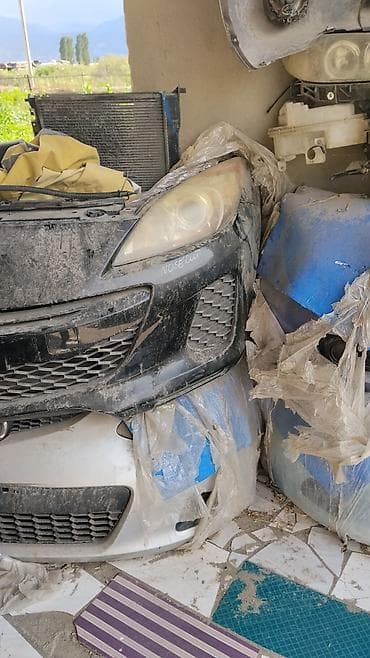 Бампер Mazda, Оригинал — 4
