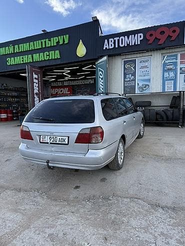 spark premier: Nissan Primera: 2002 г., 2 л, Механика, Бензин, Универсал — 1
