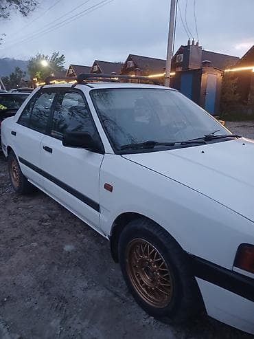 лобовое стекло мазда: Mazda 323: 1989 г., Седан — 4