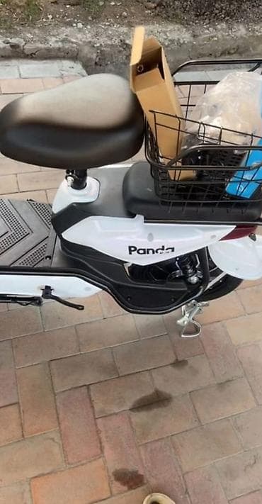 Электрический скутер Panda (белый) абсолютно новый мне его