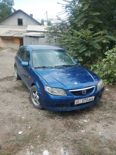 пружины нива: Mazda 323: 2003 г., 2 л, Механика, Дизель, Хэтчбэк — 1