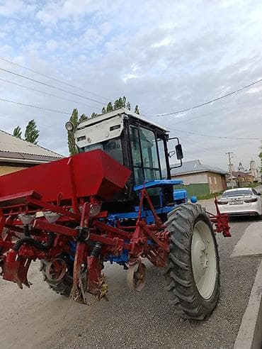 монипулятор кант: Колёсный трактор с навесным культиватором/сеялкой (междурядная — 6