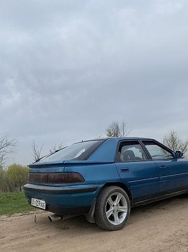 2107 газ: Mazda 323: 1992 г., 1.6 л, Механика, Бензин, Хетчбек — 6