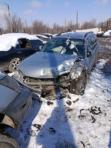 Продаётся автомобиль после ДТП на разбор. Универсал серебристого