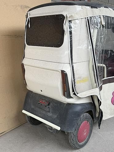 мото желмая: Электрический трёхколёсный скутер с крытым кузовом (кабина) - — 3