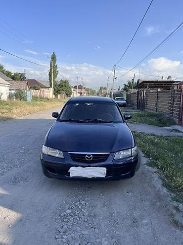 стоп gx: Mazda 626: 2000 г., 2 л, Механика, Бензин, Седан — 1