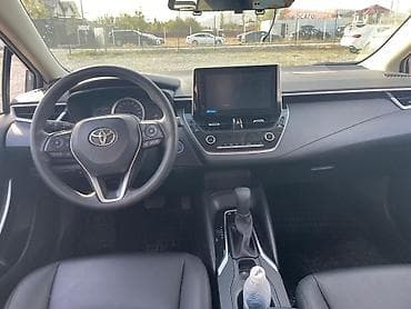 byd e3: Toyota Corolla: 2021 г., 1.8 л, Вариатор, Гибрид, Седан — 9