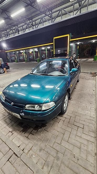 Продажа авто: Mazda 626: 1993 г., 2 л, Механика, Бензин, Хэтчбэк — 6