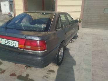 аудио касета: Mazda 626: 1992 г., Ручные, Седан — 3