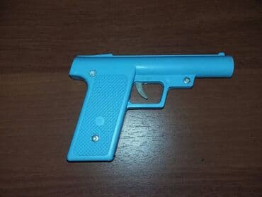 Игрушка-пистолет