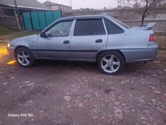 обмен машинами с доплатой: Daewoo Nexia: 2012 г., 1.5 л, Механика, Бензин, Седан — 3