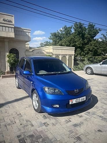 Mazda Demio: 2003 г., 1.5 л, Автомат, Бензин, Хэтчбэк — 1