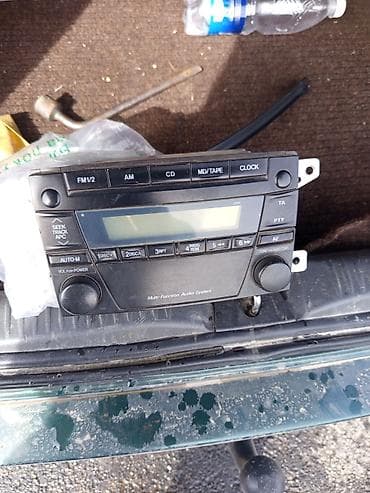 датчик положения распредвала: Штатная автомагнитола “Multi-Function Audio System” для Mazda — 1