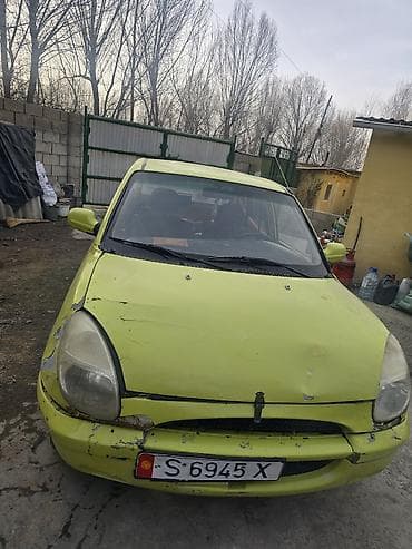 suzuki машина: Daihatsu Sirion: 1998 г., 0.1 л, Ручные, Бензин, Хэтчбэк — 3