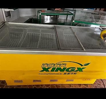Морозильный ларь XINGX с раздвижными стеклянными крышками. - Тип