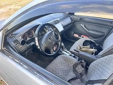 Honda Civic: 2004 г., 1.5 л, Автомат, Бензин, Седан