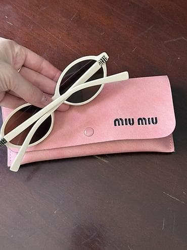 Солнцезащитные очки: Солнцезащитные очки Miu Miu
Реплика 
Одевала пару раз — 2