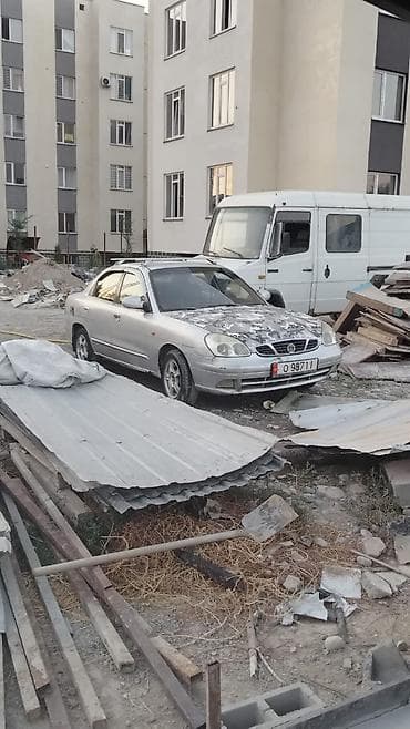 шина на матиз: Daewoo Nubira: 1999 г., Механика, Бензин, Седан — 4