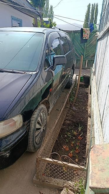 Honda Odyssey: 1998 г., 2.3 л, Автомат, Бензин, Универсал — 4