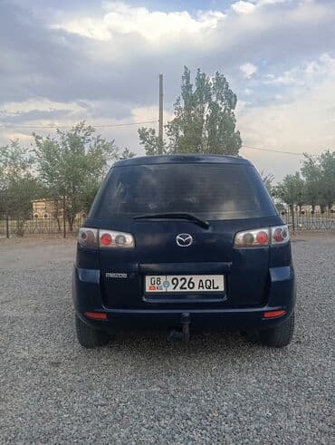машина не нахаду: Mazda 2: 2004 г., 1.4 л, Механика, Бензин, Хетчбек — 3