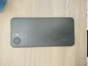 Смартфон Realme (линейка Spark/Pop, матовый тёмно‑серый корпус) -