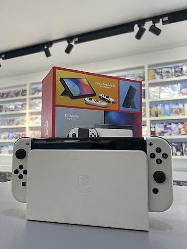купить switch: Nintendo Switch OLED (модель с белыми Joy‑Con) Б/у - Экран OLED 7" — 1