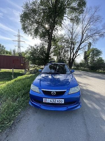 yamaha yzf r1: Mazda Familia: 2002 г., 1.6 л, Механика, Бензин, Хэтчбэк — 4