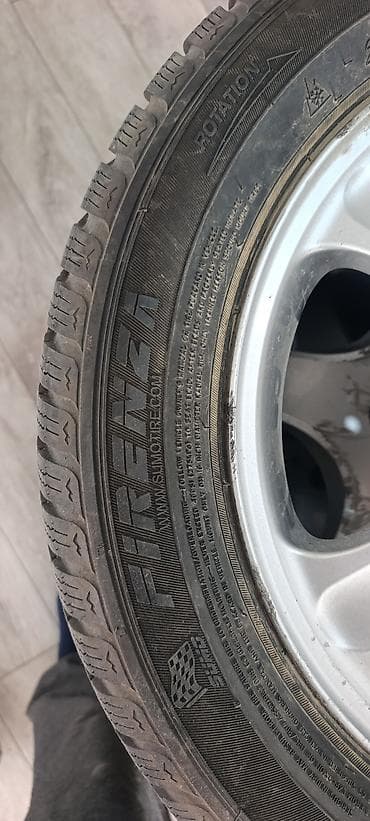 Зимние шины 205/55/16 продаю только резину. цена 15тыс 4 шт