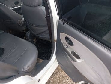 машина для полировки: Белый хэтчбек Daewoo Matiz — компактный городской автомобиль, который — 1