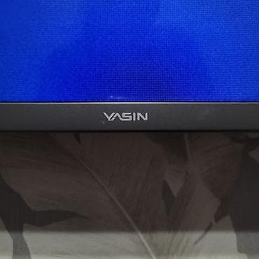 tab a: Телевизор YASIN, диагональ около 55–65" (тонкие рамки, настенное — 2