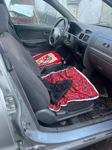 автомобиль тико: Kia Rio: 2005 г., Механика, Бензин, Хетчбек — 7