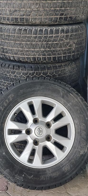6: Литые диски Toyota с зимними шинами Dunlop Grandtrek SJ5 - Диаметр — 2