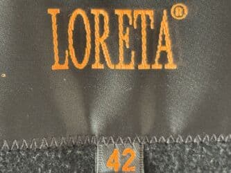 теплый и удобный: Элегантное женское пальто прямого кроя в черном цвете с меховой — 3