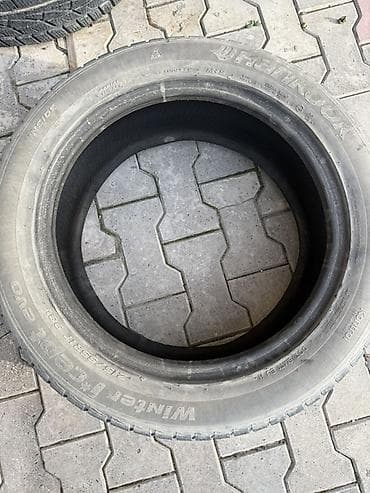 98: Шины 215 / 55 / R 17, Зима, Легковые, Hankook — 1