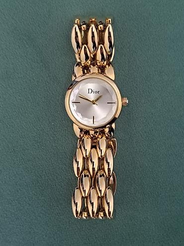 Личные вещи: Женские наручные часы Dior. - Элегантный круглый корпус с — 1