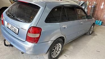 super cub: Mazda 323: 2002 г., 1.6 л, Механика, Бензин, Универсал — 2