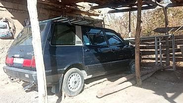 Унаа: Asia : 1991 г., 2 л, Кол менен иштөөчү, Бензин, Универсал — 6