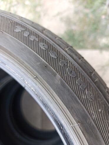 новые шыны: R-18 -215-45. Привозные из Японии. Шины летние комплект 4 шт. По нашим — 6