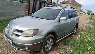прикуриватель outback: Mitsubishi Outlander: 2004 г., 2 л, Механика, Бензин, Кроссовер — 3