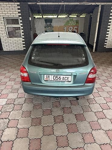 Mazda 323: 2001 г., 1.6 л, Автомат, Бензин, Универсал